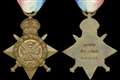 Medal belonging to first British soldier killed in Great War sells for £17,000