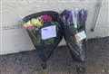 Tributes left to woman found dead