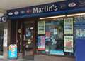 Armed robbers threaten newsagent's staff in knife raid