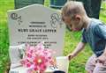 Church removes mementoes from baby's grave