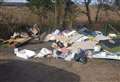 Huge piles of rubbish dumped in lane