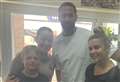 'Humble' football star poses with customers at popular Kent cafe