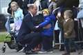 Prince of Wales hugs little boy and promises to put picture on his fridge