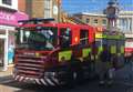 Firefighters called to repair shop sign