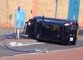 Car overturns in town centre