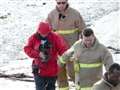 Woman and dog rescued from mud