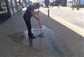 Town sweeping up after water main bursts