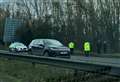 Dual carriageway blocked as car crashes into trees