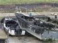 Probe after blaze destroys boats