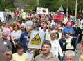 Hundreds join protest against double village threat