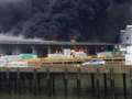 Smoke plume billows over town