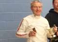 Veteran fencer Ralph Johnson celebrates another victory 