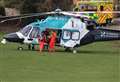 Woman hit by cricket pitch cover blown over by air ambulance helicopter