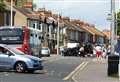 Overturned car blocks road 