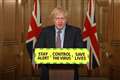 Johnson ‘very proud’ of coronavirus response as death toll passes 50,000