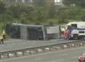 Long delays as lorry rolls over on M20