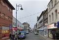 Woman found dead at town centre property