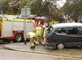 Crash car wedged on power cable