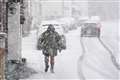 In Pictures: UK and Ireland shiver as snow and sleet sweep in