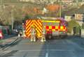 Road sealed off after car crashes into gas container