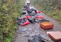 Huge fly-tipping mess forces closure of road