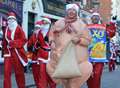 He's winging it! A sea of Santas hit town in festive charity run