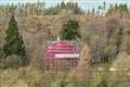 Castle swathed in seven-storeys of pink mesh for conservation work