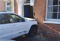 Car crashes into house