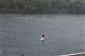 Paddleboarder spotted on the Thames during stormy conditions