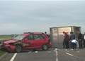 Turned over trailer partially blocks Sheppey Crossing