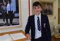 School boy recognised after aiding elderly injured man