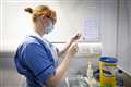 Covid-19 positivity rate drops 50% in healthcare workers after first jab – study