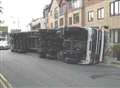 Driver hurt as lorry overturns