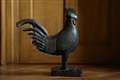 Cambridge college to return looted cockerel statue to Nigeria