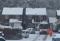 Bin men spotted playing in the snow