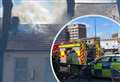 Police and fire crews called to blaze above shop 