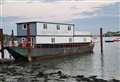 'Monstrosity’ houseboat blighting village's river views