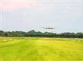 Parachutist lands in field