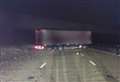 Jackknifed lorry blocks motorway after hitting bridge