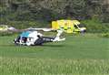 Air ambulance lands in field after crash