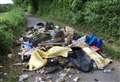 Giant mound of rubbish closes road