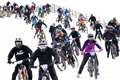 Hundreds of daring mountain bikers in 900m descent of snow-capped mountain