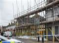 Fallen scaffolding and trees toppled after strong winds