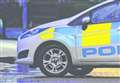 Road closed after man 'spotted with weapon'