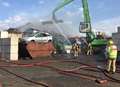 Around 50 firefighters tackle huge scrap yard blaze