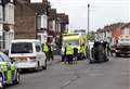 Driver trapped after car overturns in High Street