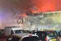 Fire crews battle huge car garage unit blaze