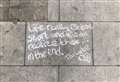 Mystery messages scribbled around town