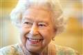 Smiling Queen enjoys socially-distanced military tribute to mark birthday