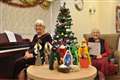 Pensioners perform their own Christmas song in care home